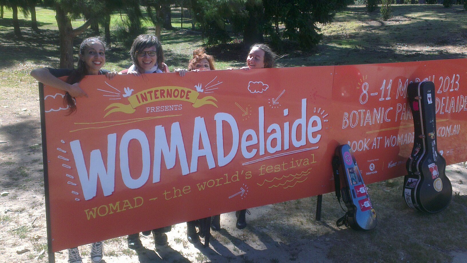Kat, Heather, Michaela and Michelle by the WOMADelaide Banner!